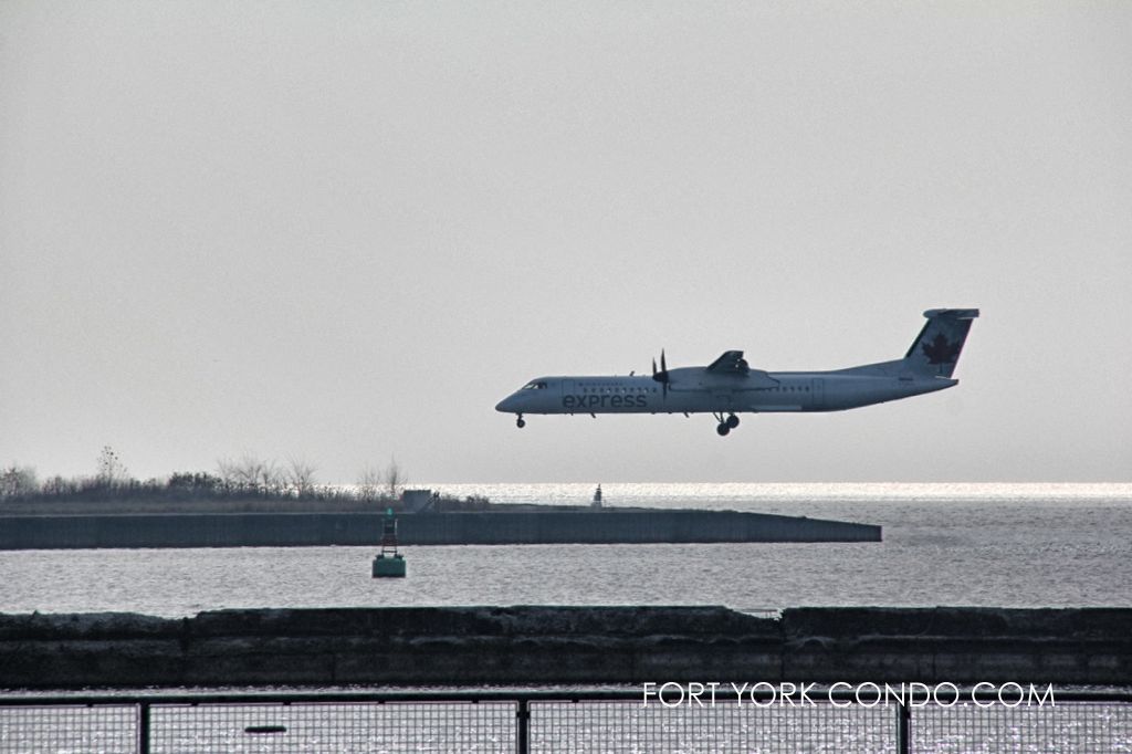 Air Canada Express landing at Toronto Island Airport near Liberty Village